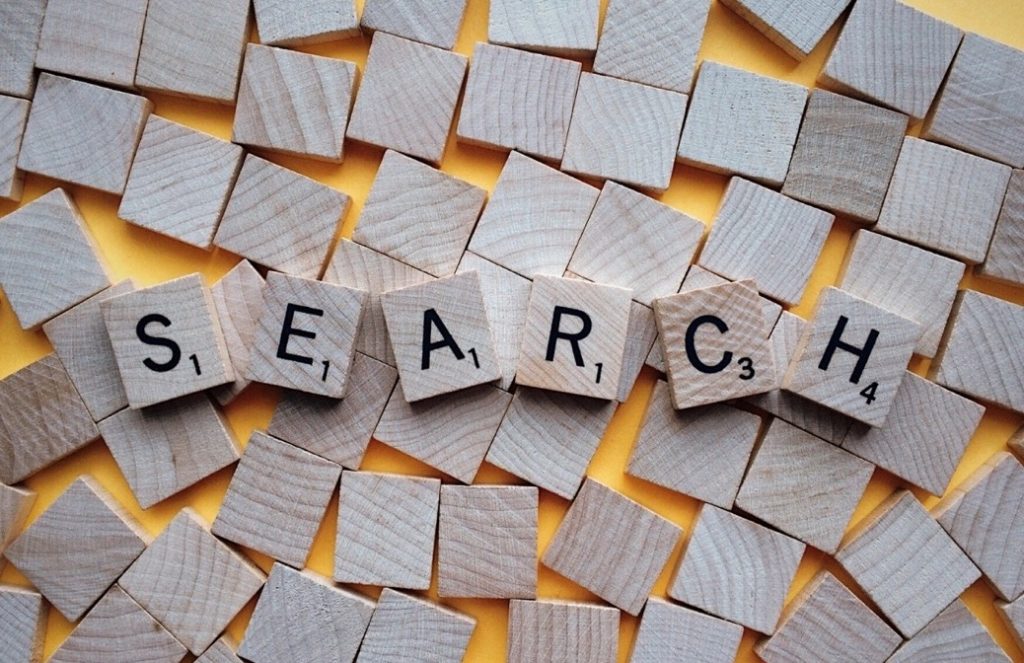 SEARCH arranged with wood letter blocks